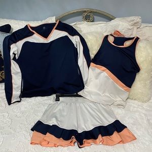 Tail Tennis Set with a skort, a racer back top and a v-neck long sleeve top.